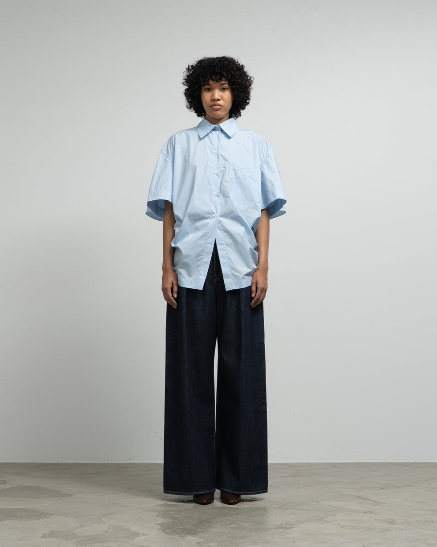 BLUE COTTON SHIRT WITH A TWISTED BACK