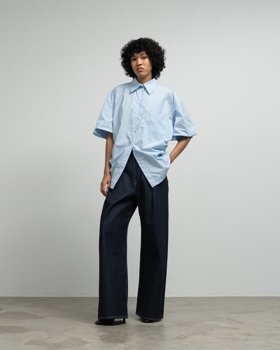 BLUE COTTON SHIRT WITH A TWISTED BACK