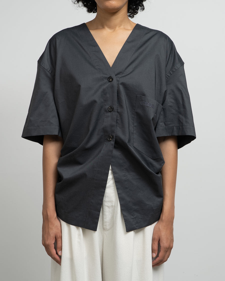 VISCOSE BLEND BLOUSE WITH A TWISTED BACK