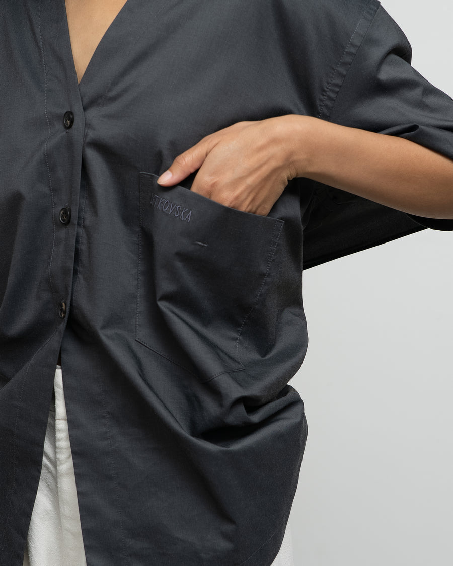 VISCOSE BLEND BLOUSE WITH A TWISTED BACK